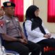 Foto: Bripka Krisna Maharta dengan Wabup Dewi Khalifah, @by_News9.id