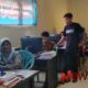 Foto: Pejabat (PJ) Desa Pamolokan, Ahmad Sayadi, saat mengecek pelayanan di kantor balai Desa Pamolokan, @by_News9.id