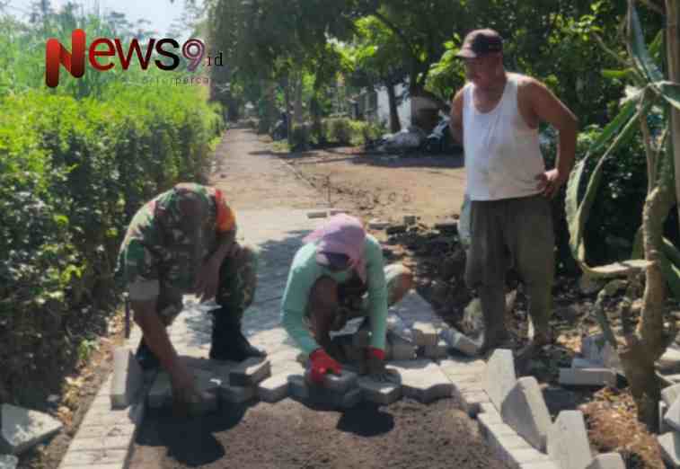 Foto: Pendampingan karya bakti pavingisasi jalan setapak sepanjang 122 meter, @by_News9.id