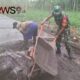 Foto: Kopda Zaenal Arifin bersama perangkat desa dan warga melaksanakan kerja bakti, @by_News9.id