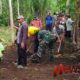Foro: Sertu Aryono, bersama perangkat desa dan masyarakat melaksanakan kerja bakti. @by_News9.id