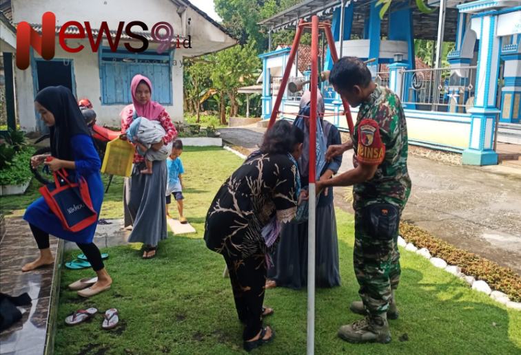 Foto: Serda Aryanto, melaksanakan pendampingan dalam kegiatan Posyandu. @by_News9.id