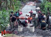 Semangat Kebersamaan: Danki SSK TMMD ke-123 dan Warga Burno Tetap Giat Bangun Jalan di Bulan Puasa