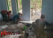 Satgas TMMD ke-123 Kodim 0821/Lumajang dan Warga Gotong Royong Pasang Keramik RTLH di Desa Burno