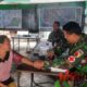 Foto: Kegiatan pengobatan gratis yang digelar oleh Satgas TMMD di Dusun Mlambing. @by_News9.id