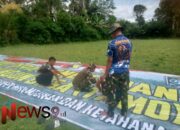 Satgas TMMD ke-123 Kodim 0821/Lumajang Pasang Banner Penutupan di Dusun Tugu