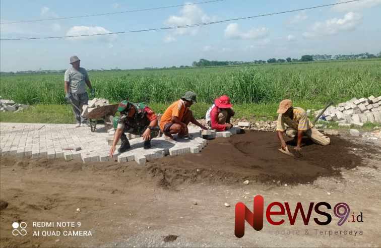Foto: Sertu Syafiudin turut serta memberikan pendampingan dan motivasi kepada warga. @by_News9.id