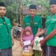 Foto: Pimpinan Ranting (PR) GP Ansor Karangbudi saat memberikan santunan anak yatim dan dhuafa. @by_News9.id