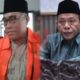 Foto: Kepala Desa Kangayan, Arsan yang ditahan oleh Lejari Sumenep, dan Dul-Siam (kanan) yang merupakan kader PKB dan masih aktif sebagai anghota dewan. @by_News9.id