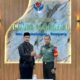 FOTO: Direktur Klinik Pratama Bunda Maharani, Husnul Maulidi, S.Kep., Ns. dan Danramil 0828/11 Tambelangan, Letda Inf. Ali Murdani, @by_News9.id