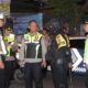 FOTO: Polres Lamongan saat pengamanan Malam Suroan sekaligus Pengesahan Warga Baru PSHT. @by_News9.id