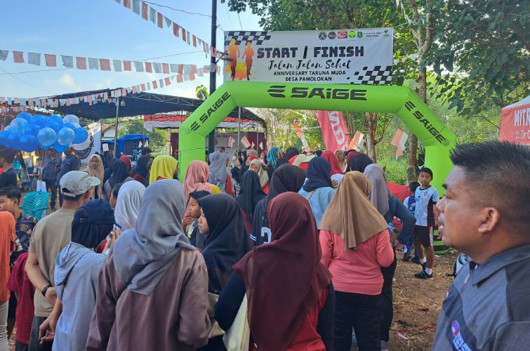 FOTO: Para peserta Jalan Jalan Sehat (JJS) saat tiba di finish. @by_News9.id