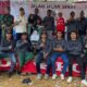 FOTO: Pengurus Organisasi Taruna Muda, bersama PJ Kepala Desa dan Babinsa Pamolokan, @by_News9.id