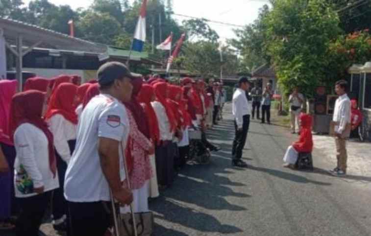 FOTO: Peserta Paguyuban Penyandang Disabilitas PDL Upacara pengibaran bendera merah putih HUT RI 80. @by_News9.id