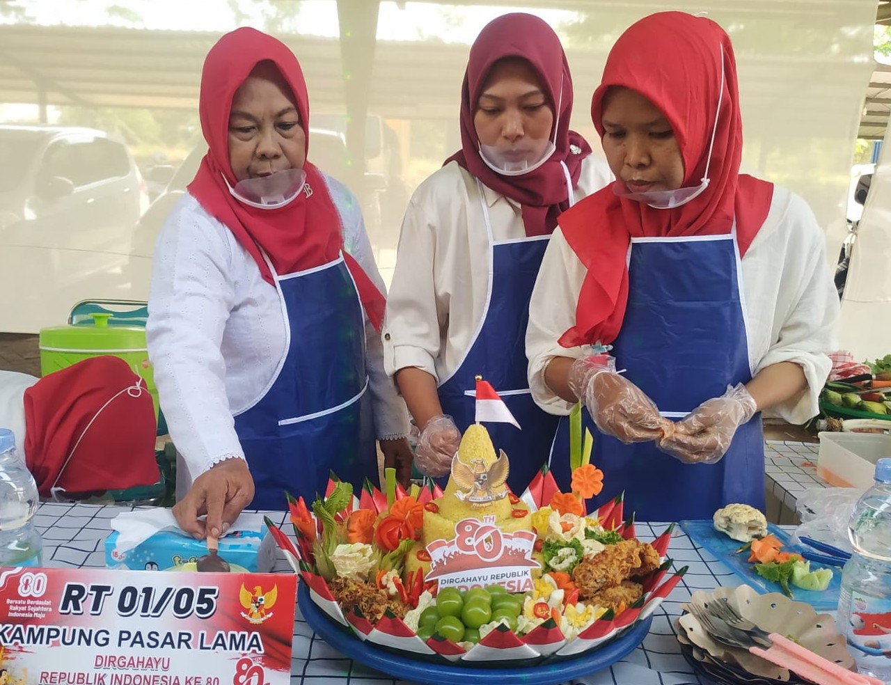 FOTO: Antusias salah satu peserta yang ikut serta dalam lomba tumpeng. @by_News9.id