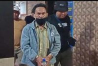 FOTO: Andik terduga Saat digelandang ke Mapolres Lumajang. @by_News9.id
