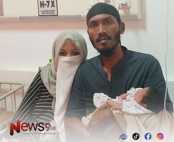 FOTO: Hulwatun bersama suaminya, Ahmad Junaidi (38), usai menjalani proses persalinan di RSUD dr. Moh. Anwar Sumenep. @by_News9.id
