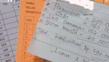 FOTO: Kartu Iuran siswa SDN 02 Rogotrunan lumajang. @by_News9.id