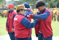 FOTO: Wakil Bupati Sumenep, KH. Imam Hasyim, secara simbolis melepas kontingen. @by_News9.id