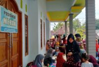 FOTO: Pelayanan kesehatan dasar masyarakat melalui kegiatan rutin Pos Pelayanan Terpadu (Posyandu). @by_News9.id